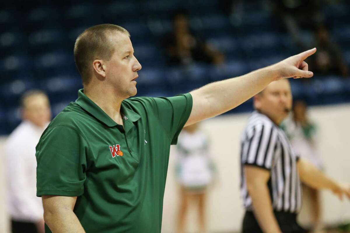 The Woodlands head coach Dale Reed guides his team during the boys basketball game against Longview on Monday, Feb. 19, 2018, at Angelina College in Lufkin. (Michael Minasi / Houston Chronicle)