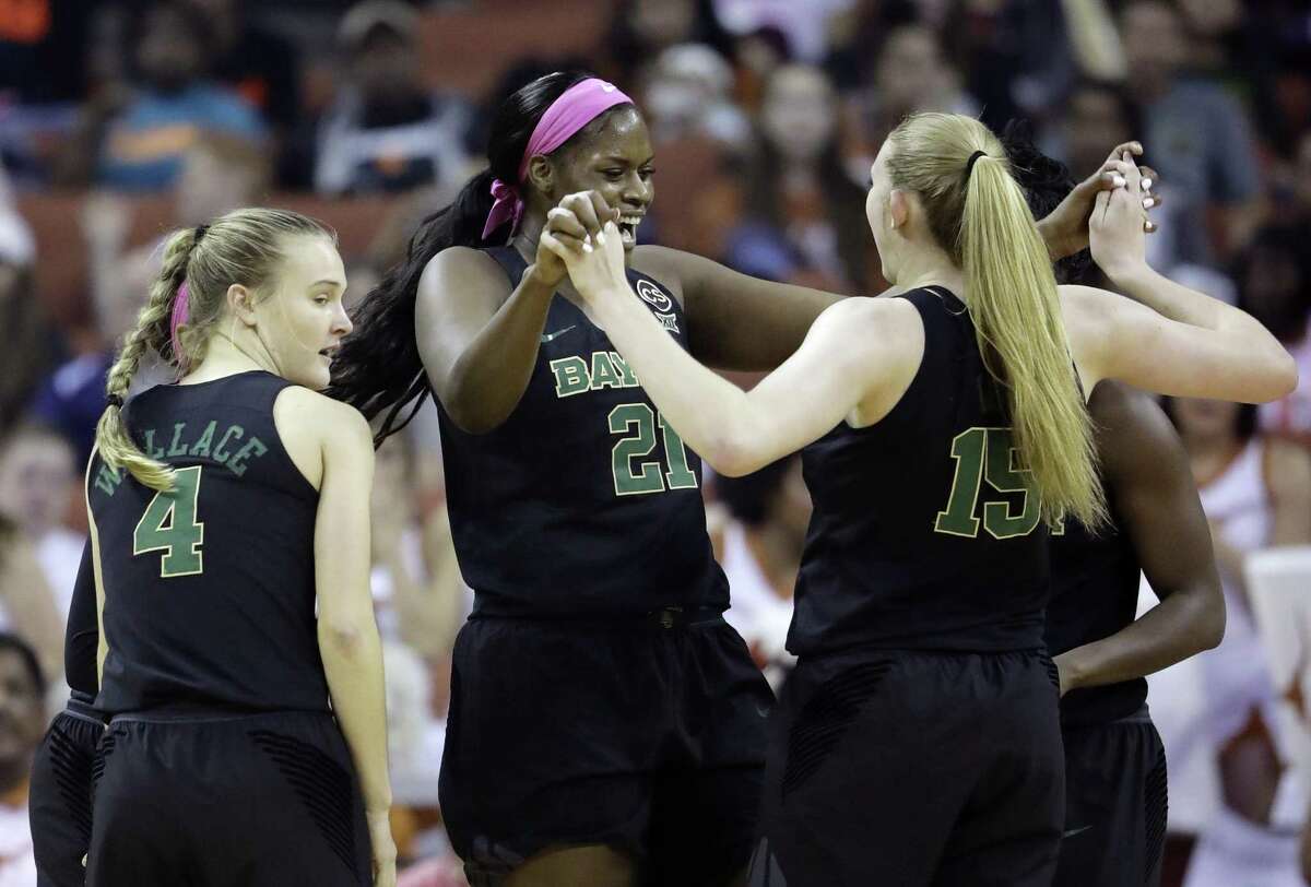 Baylor center Kalani Brown (21) leads the celebration with teammates in the first half at the Erwin Center.