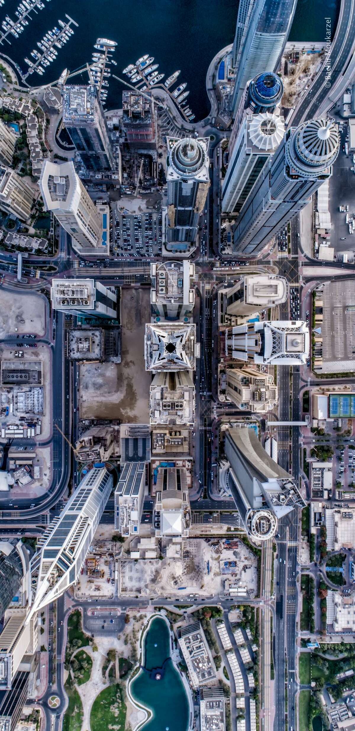 Drone photographer Bachir Moukarzel captures incredible new perspectives of Dubai by looking at the city's infrastructure and buildings at a 90-degree angle from above the sites. He shares his photos with tens of thousands of followers on Instagram.