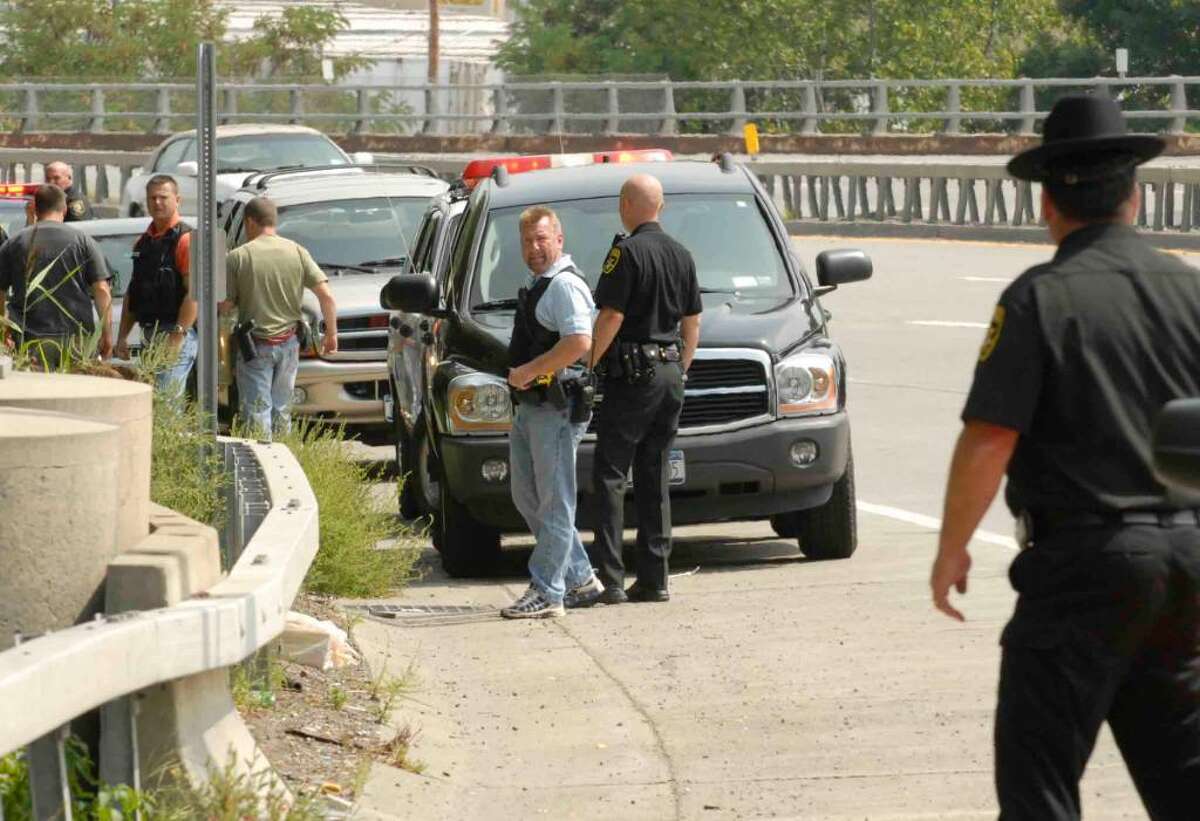 Authorities search for a fugitive along Route 32 in Albany today. (Michael P. Farrell / Times Union )