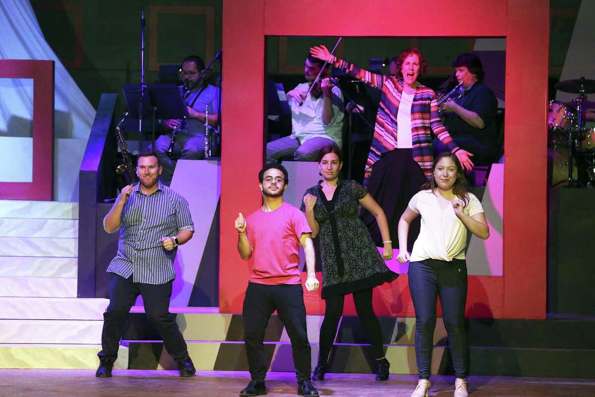 Anna Gangai (inside the red frame) is featured in “Buenos Aires,” one of the songs from “Evita” in the show. She is joined onstage by (from left) Bryan Stanton, Michael Parisi, Marie Gouba and Sami Serrano.