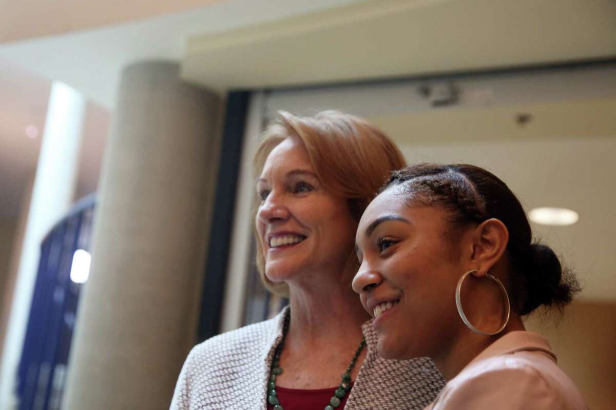Seattle Mayor Jenny Durkan takes a photo with Rainier Beach senior and ASB President Nyshae Petty after delivering her first State of the City address at Rainier Beach High School, Tuesday, Feb. 20, 2018. Petty gave a brief speech before Durkan's address.