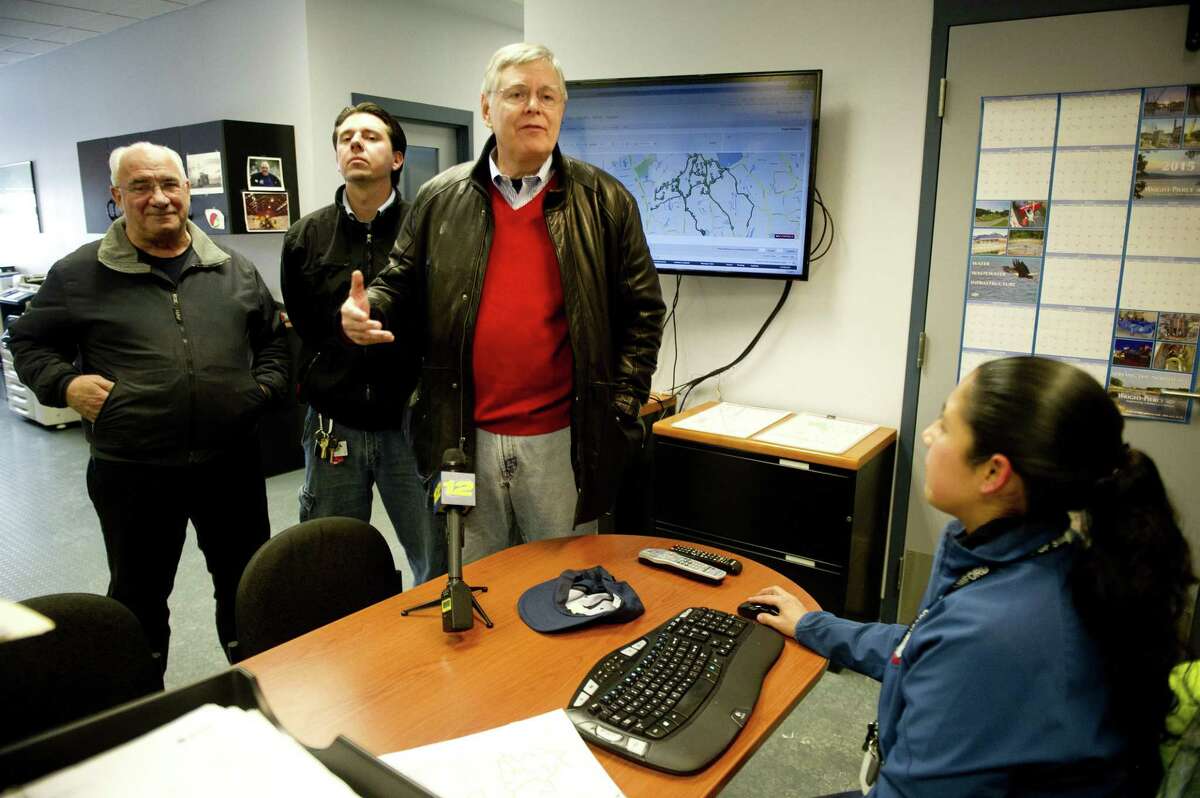 FILE — From left, Director of Operations Ernie Orgera, Traffic and Road Maintenance Supervisor Tom Turk, and Stamford Mayor David Martin speak during a press conference at the city garage on Magee Ave. in Stamford, Conn., on Tuesday, January 27, 2015.