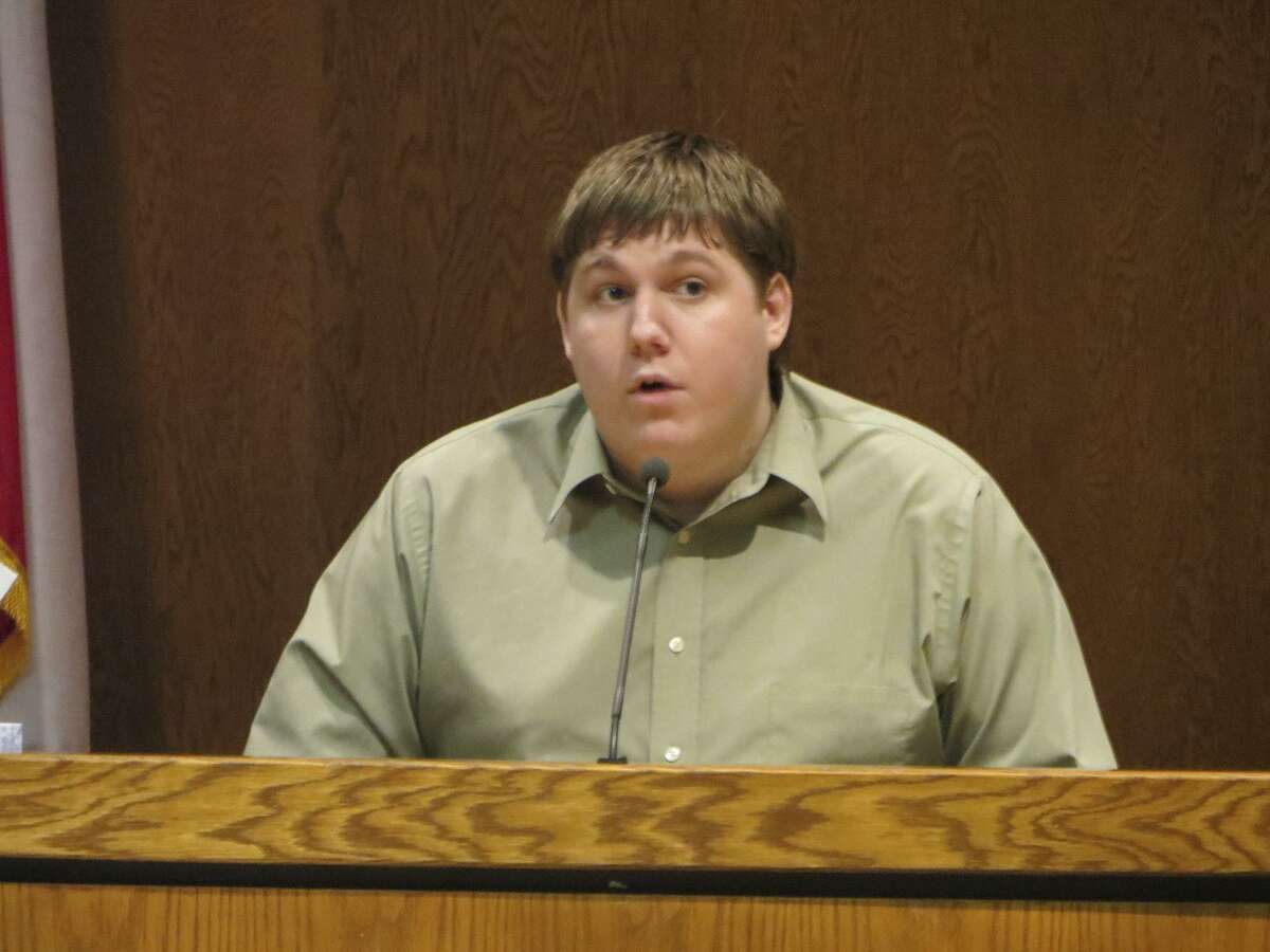 Justin Carter testifies at pre-trial hearing in Comal County on Aug. 27, 2014. Carter is charged with making a terroristic threat over a Feb. 13, 2013 Facebook entry in which he wrote about shooting up a kindergarten. He claims he was joking.