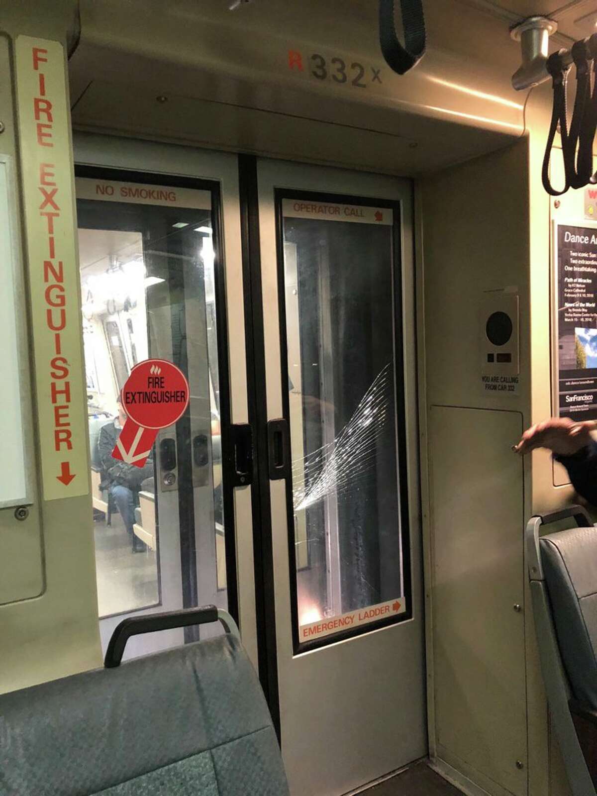 Cracked glass on a BART door after a would-be thief reportedly attempting to steal a passenger's phone resulted in a scuffle.