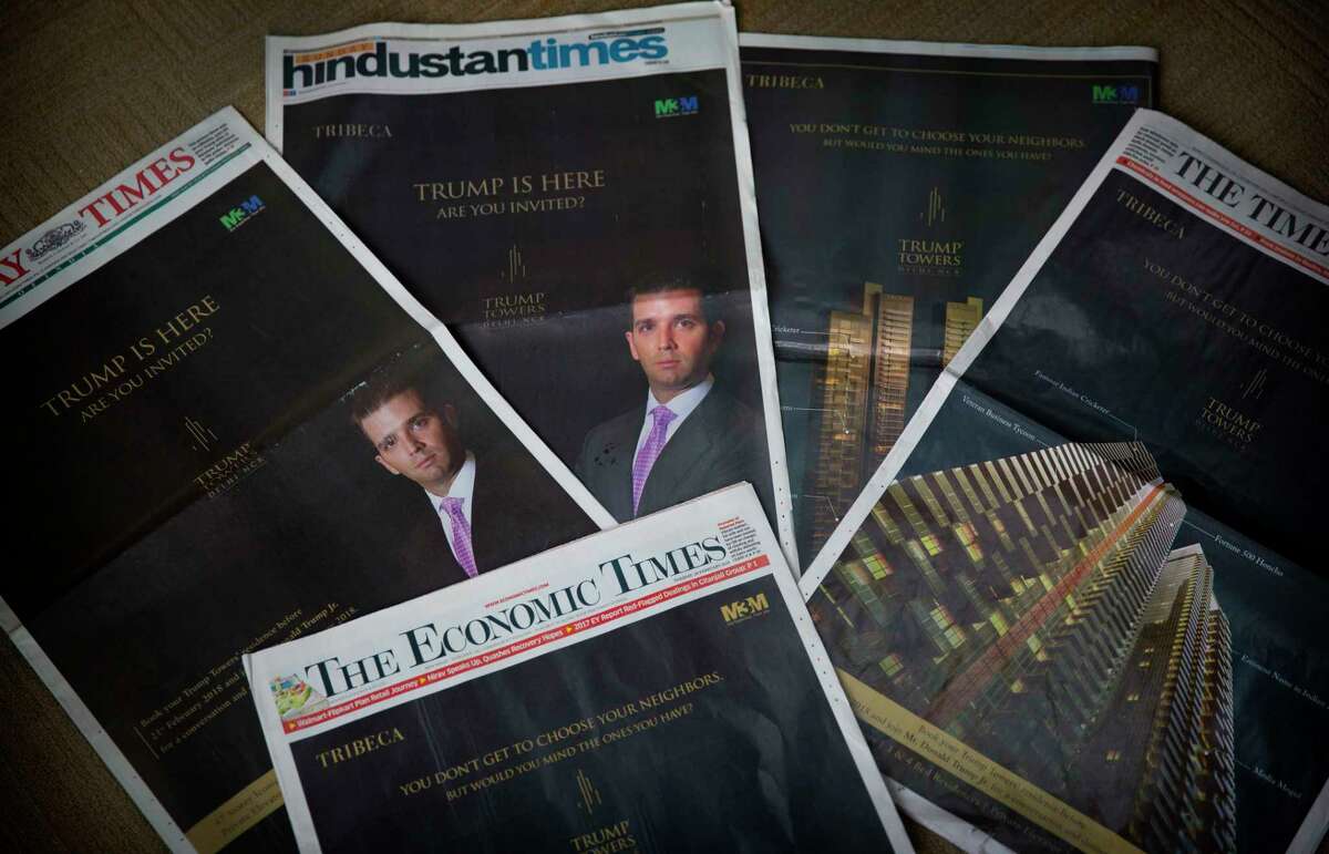 The eldest son of US President Donald Trump, Donald Trump Jr's Trump Towers ads are seen in major newspapers in New Delhi, India, Tuesday, Feb. 20, 2018. "Trump has arrived. Have you?" shout the barrage of glossy front-page advertisements in almost every major Indian newspaper. The ads, which have run repeatedly in the past few days, herald the arrival not of the American president but of his eldest son, Donald Trump Jr., who is in New Delhi to sell luxury apartments and lavish attention on wealthy Indians who have already bought units in a Trump-branded development outside of the Indian capital. (AP Photo/Manish Swarup)