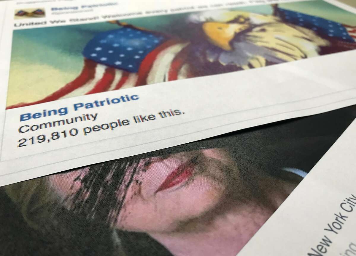 A Facebook posting, released by the House Intelligence Committee, for a group called "Being Patriotic" is photographed in Washington, Friday, Feb. 16, 2018. A federal grand jury indictment on Feb. 16, charging 13 Russians and three Russian entities with an elaborate plot to interfere in the 2016 U.S. presidential election, noted that beginning in June 2016, defendants and and their co-conspirators organized and coordinated political rallies in the U.S. The "Being Patriotic" promoted and organized two political rallies in New York according to the indictment. (AP Photo/Jon Elswick)
