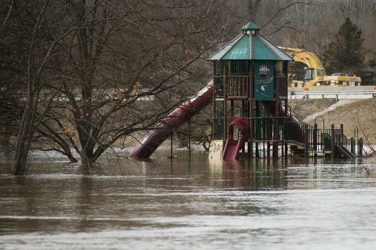 Chippewassee Park is partially flooded on Wednesday, Feb. 21, 2018. The river is expected to crest on Thursday at 26.4 feet. (Katy Kildee/kkildee@mdn.net)