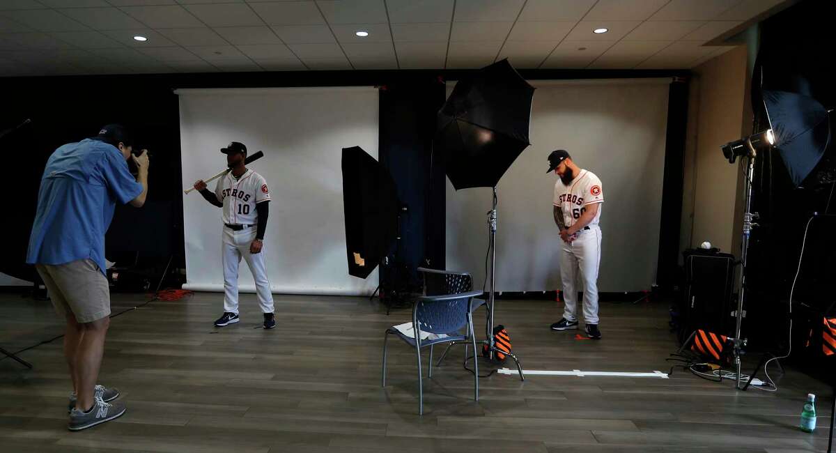 Houston Astros Yuli Gurriel (10) and pitcher Dallas Keuchel (60) get their photos taken during photo day at spring training at The Ballpark of the Palm Beaches, Wednesday, Feb. 21, 2018, in West Palm Beach. Browse through the photos for a look at every Astros player on picture day. 