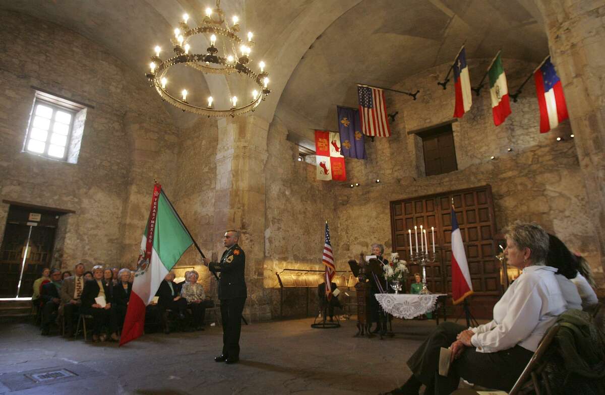 A military member from Fort Sam Houston bears the flag of Mexico as a roll call of states and nations were called out to remember the defenders of the Alamo during a memorial service at the shrine on March 6, 2007. The service marked the anniversary of the battle at the Alamo. Eleven defenders were from Mexico according to the roll call.