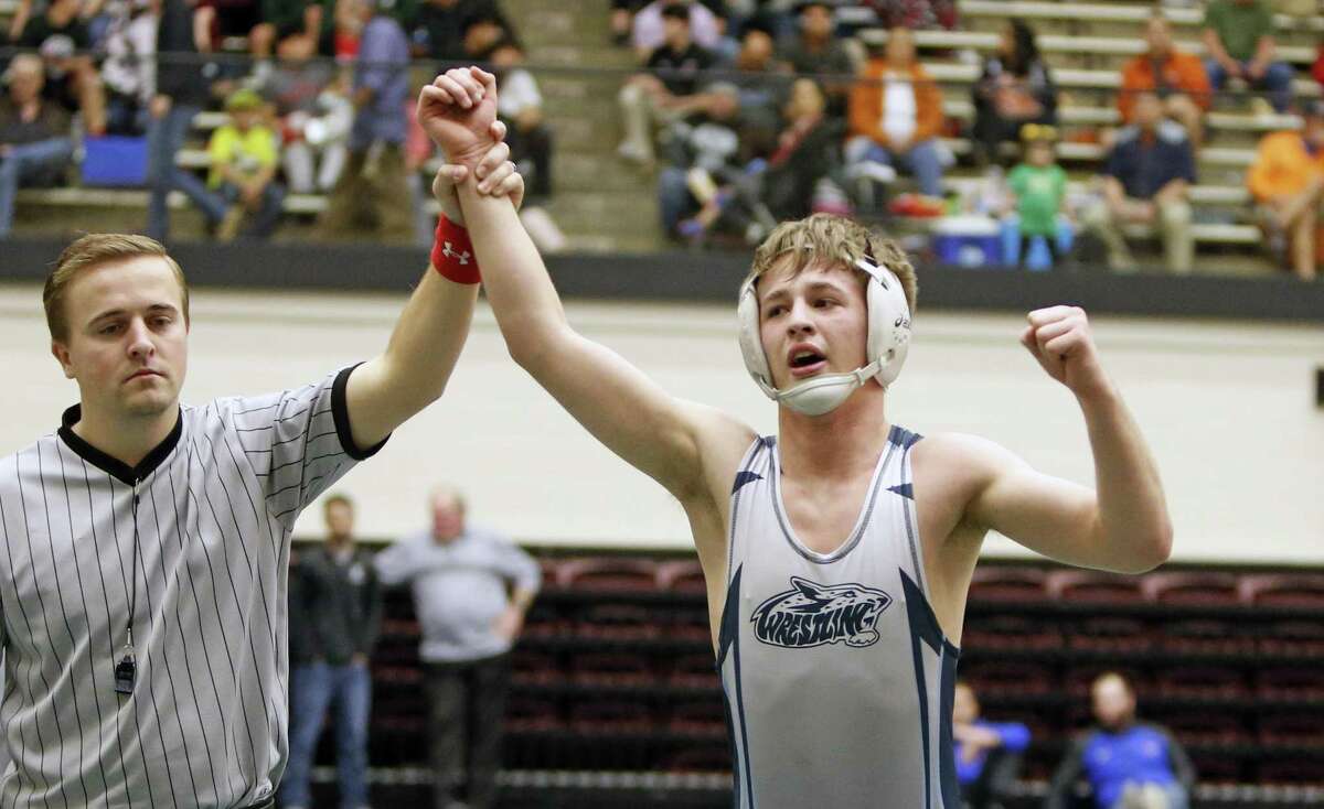 Despite Varying Backgrounds, Johnson Wrestlers Pinning Down Wins And 