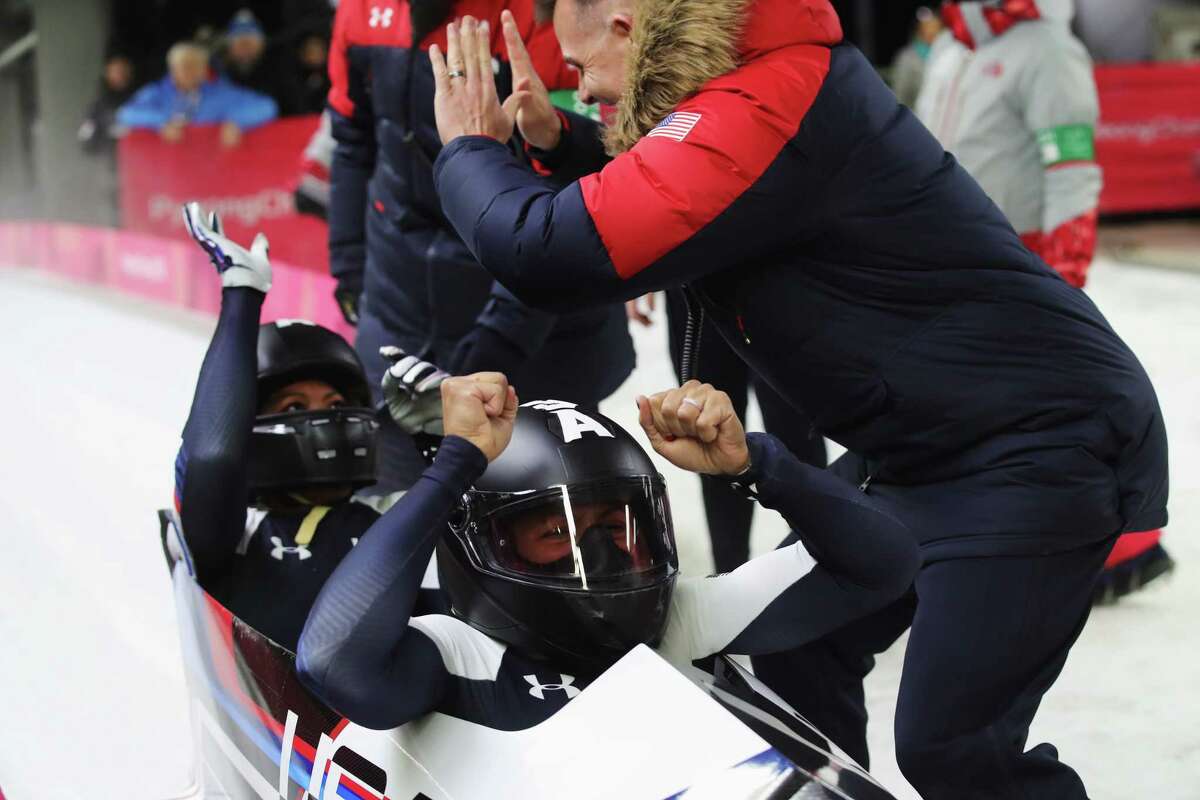 PYEONGCHANG-GUN, SOUTH KOREA - FEBRUARY 21: Elana Meyers Taylor and Lauren Gibbs of the United States celebrate in the finishing area during the Women's Bobsleigh heats on day twelve of the PyeongChang 2018 Winter Olympic Games at the Olympic Sliding Centre on February 21, 2018 in Pyeongchang-gun, South Korea. (Photo by Alexander Hassenstein/Getty Images)