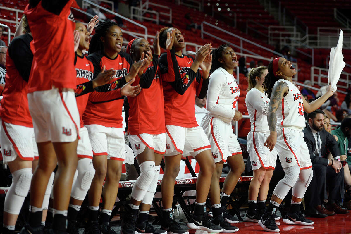 Lamar women's basketball players cheer from the bench during their final home game of the year against Houston Baptist. The team has been undefeated at home the past two years. Photo taken Wednesday 2/21/18 Ryan Pelham/The Enterprise