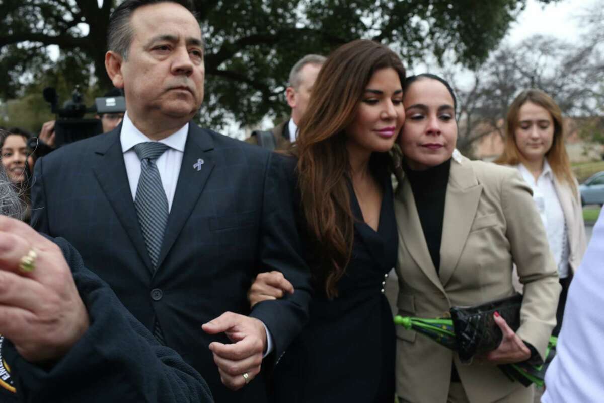 Texas State Sen. Carlos Uresti and his wife Lleanna, leave the Federal Court after he was convicted on all counts in his criminal fraud trial, Thursday, Feb. 22, 2018.