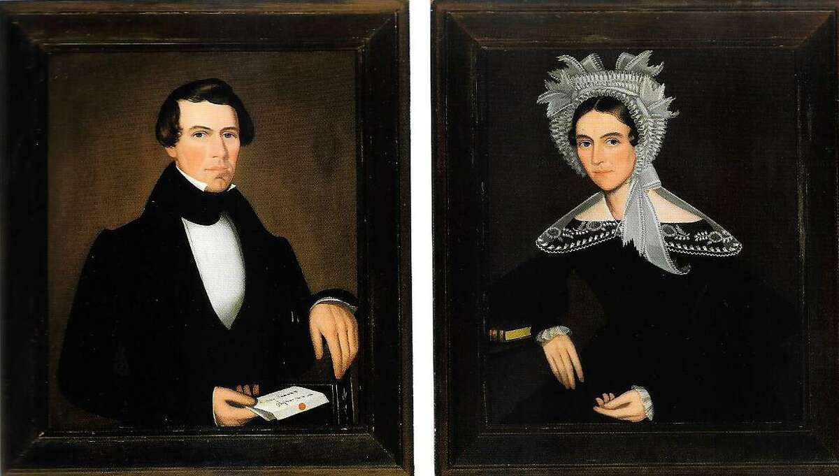 Portraits of Egbert and Phoebe Sheldon, a husband and wife painted by Ammi Phillips, as they appeared in a Sotheby’s auction catalog.