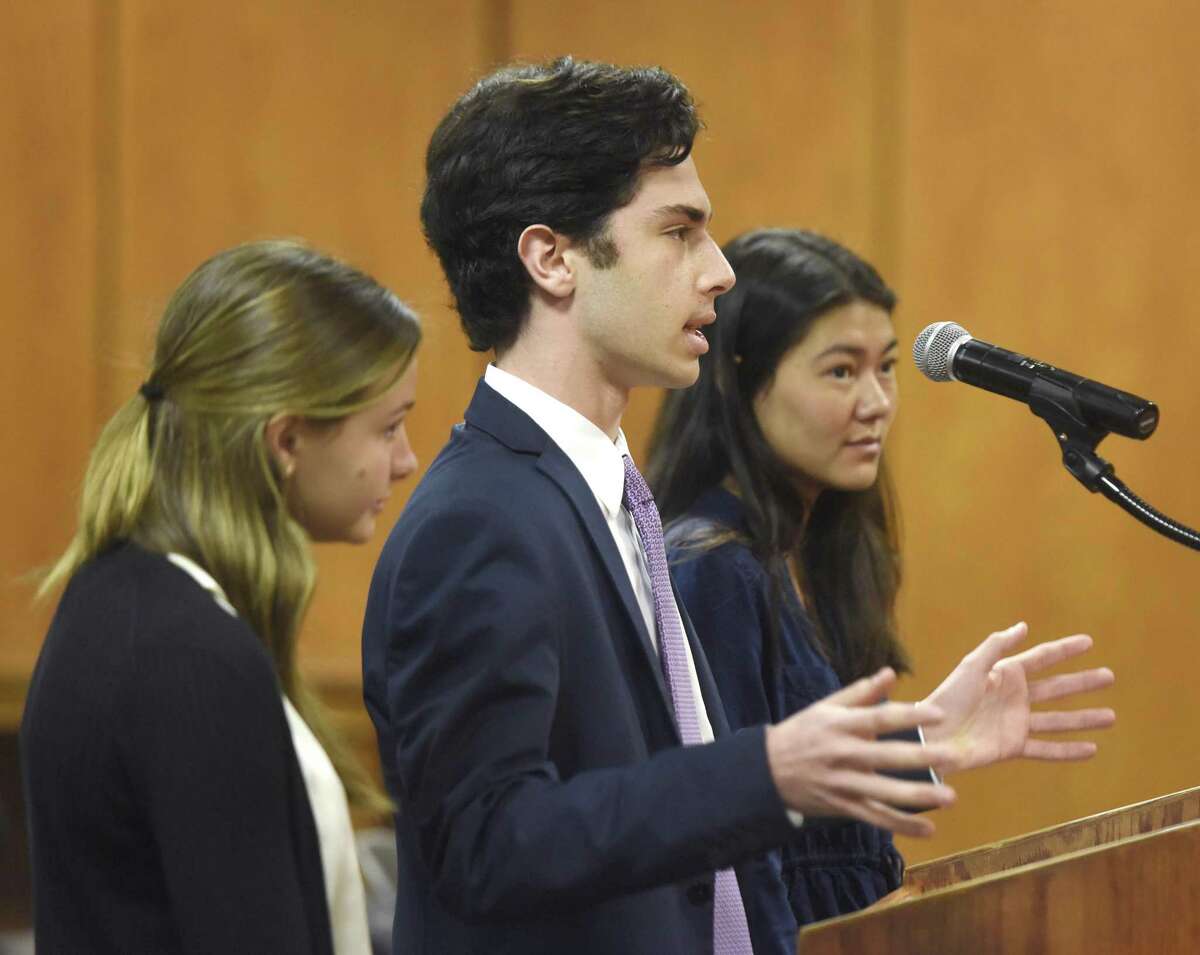 Greenwich High School Student Body President Gregory Goldstein, Vice President of Communications Catherine Veronis, left, and Class of 2018 President Alissa Landberg discuss potential parking issues at GHS during the Board of Selectmen Meeting at Town Hall in Greenwich, Conn. Thursday, Feb. 22, 2018. Selectmen and representatives from Greenwich High School discussed a potential change in parking code that could remove street parking outside Greenwich High School.