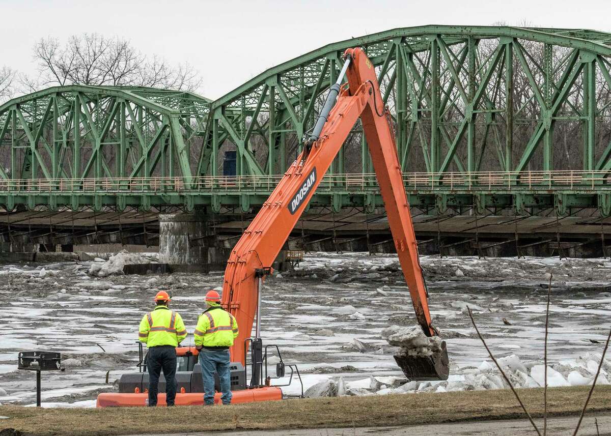 New York State DOT workers remove Ice accumulates at Lock 8 on the Mohawk River Thursday Feb. 22, 2018 in Rotterdam, N.Y. (Skip Dickstein/Times Union)