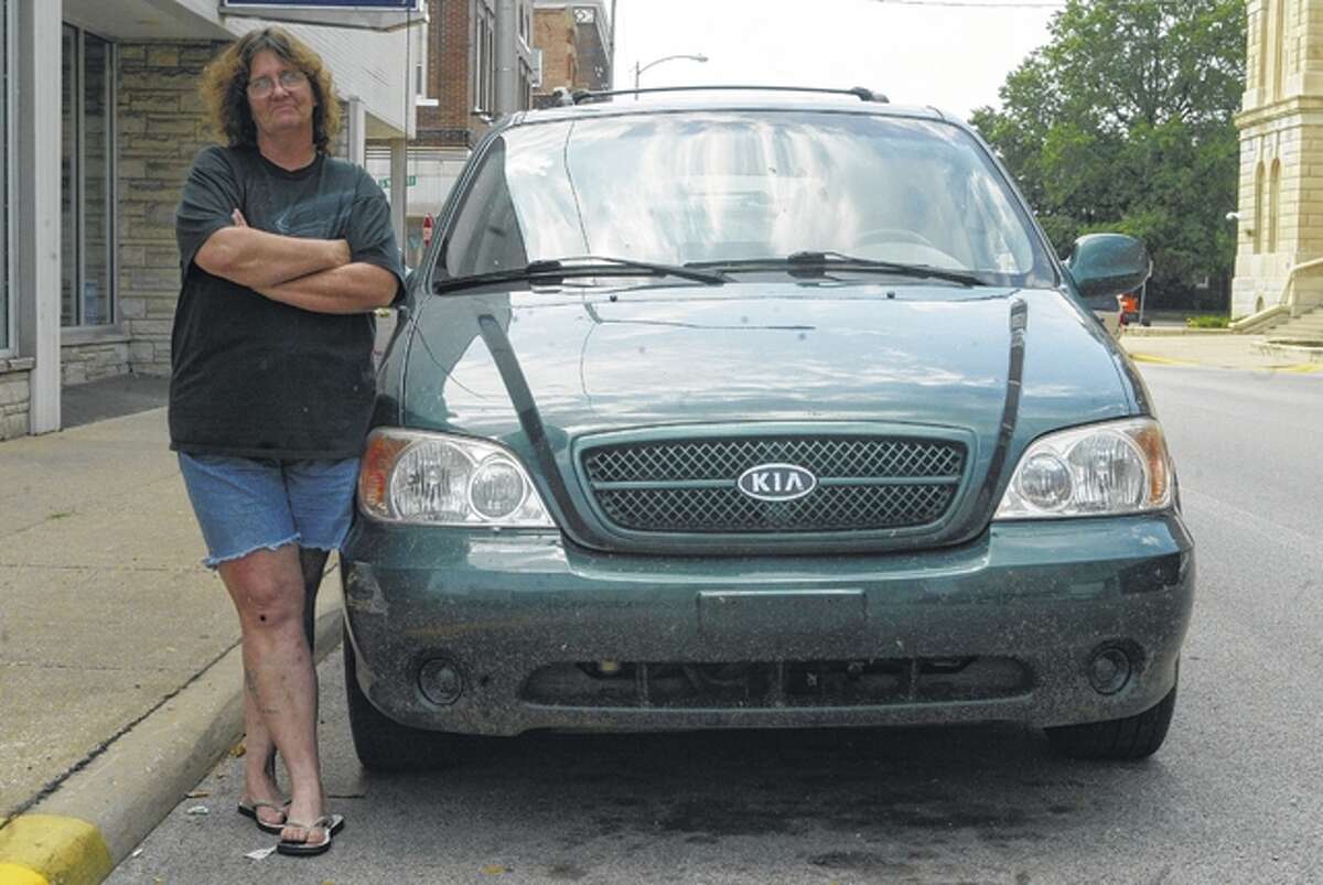 Tammy Dorzab has been unable to get a title for the van she bought from Morgan County Autoplex. The state is investigating similar reports from others who bought vehicles at the South Jacksonville dealership.