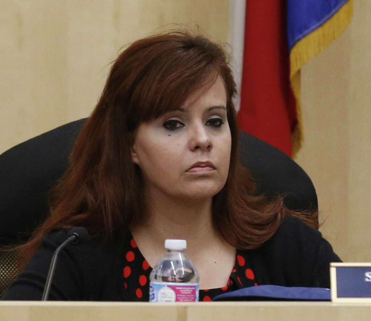 Stacey Alderete, then Stacey Estrada, a South San Independent School District trustee, attends a school board meeting in 2016. (Kin Man Hui/San Antonio Express-News)