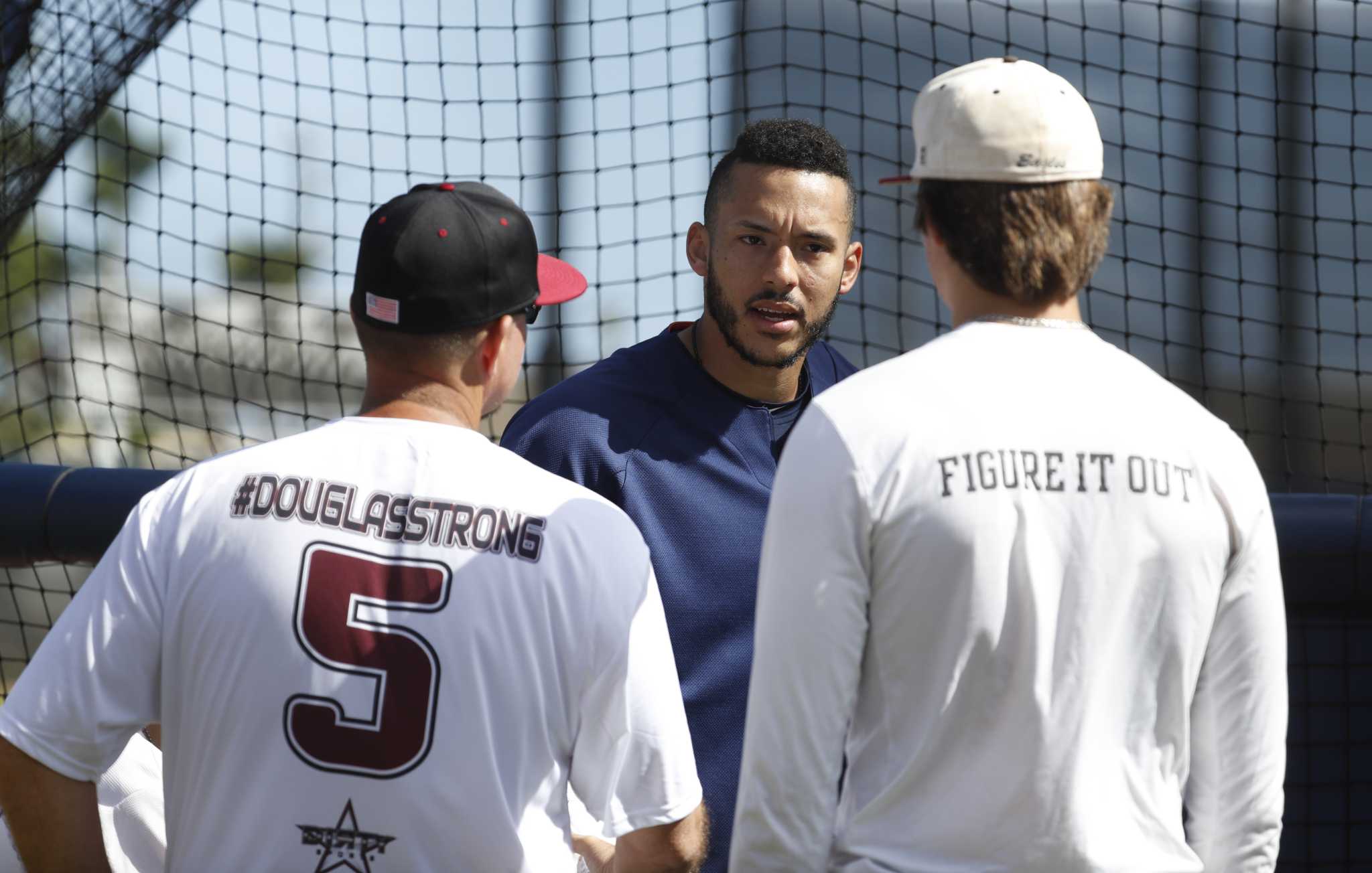 MLB teams wearing Marjory Stoneman Douglas High School caps at