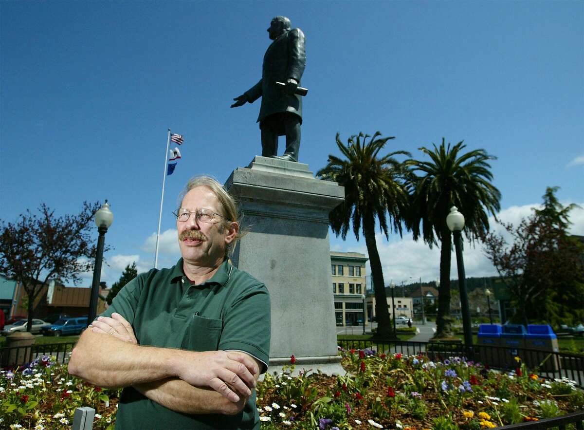 In this file photo, former Arcata councilman Dave Meserve stands beneath a statue of President McKinley in the center of the square in Arcata, Calif., Friday, May 9, 2003. 