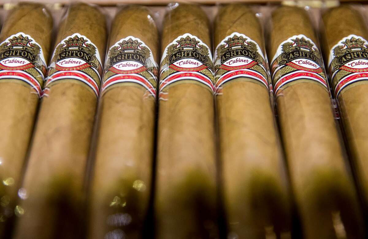 A row of cigars are seen for sale behind a locked case at Occidental Cigar Club Thursday, Feb. 22, 2018 in San Francisco, Calif.