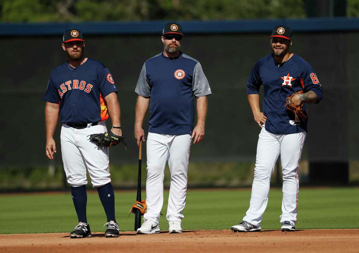 Houston Astros Tyler White (13), Morgan Ensberg, Class A Advanced manager, and Nick Tanielu (81) during spring training at The Fitteam Ballpark of the Palm Beaches, Saturday, Feb. 24, 2018, in West Palm Beach.