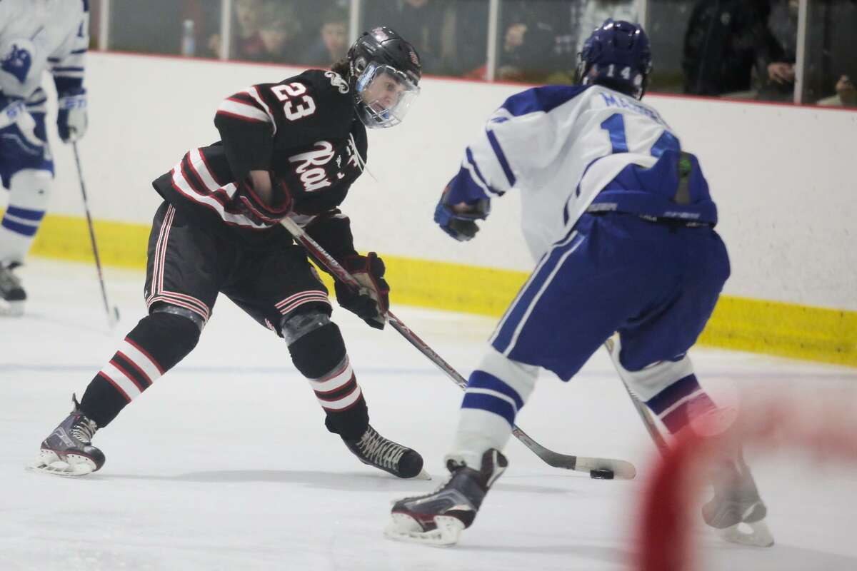 Darien boys hockey holds of New Canaan 5-2 in FCIAC quarterfinals