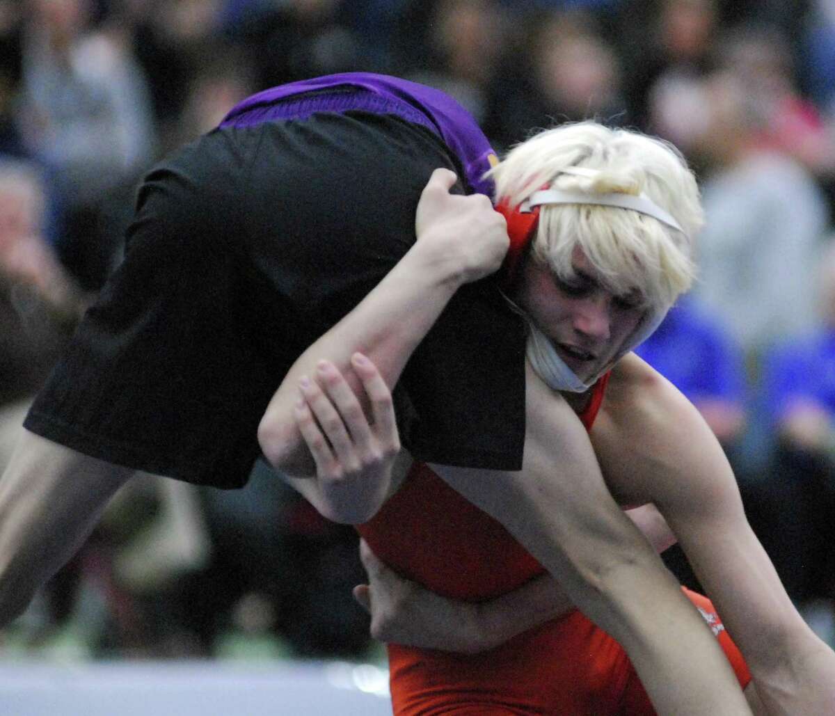 Danbury’s Ryan Jack wrestles Westhill’s Chase Parrot during the finals of the State Open, held Saturday in New Haven.