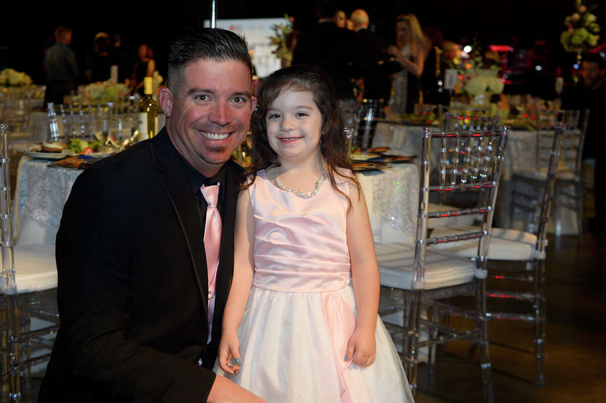 Aaron and Zoey Randall at the American Heart Association's Heart Ball at the Beaumont Civic Center on Saturday night. Photo taken Saturday 2/24/18 Ryan Pelham/The Enterprise