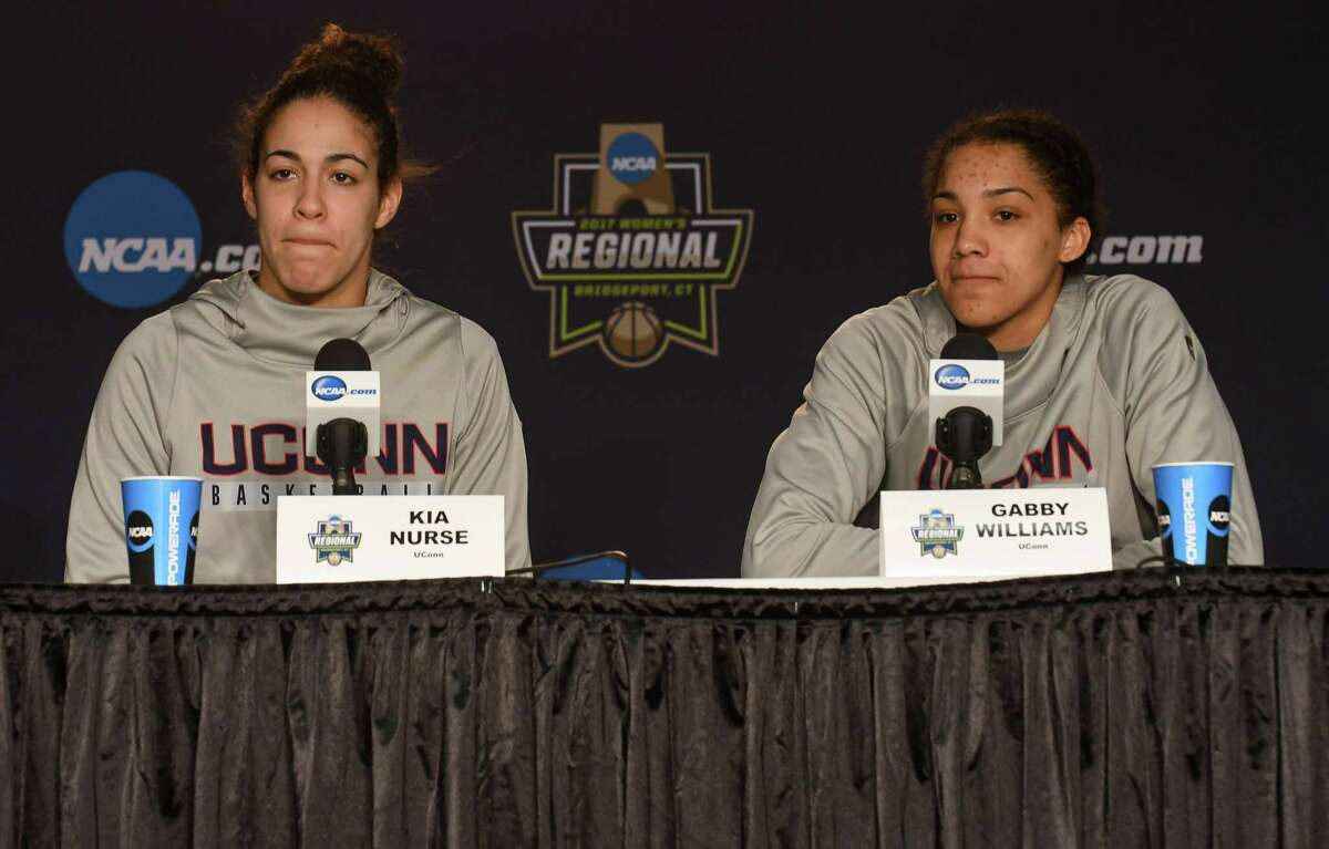 UConn’s Kia Nurse, left, and Gabby Williams address the media during a press conference at Webster Bank Arena in Bridgeport last March.