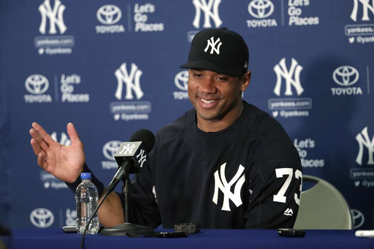 Pinstripe passer: Russell Wilson works out with Yankees