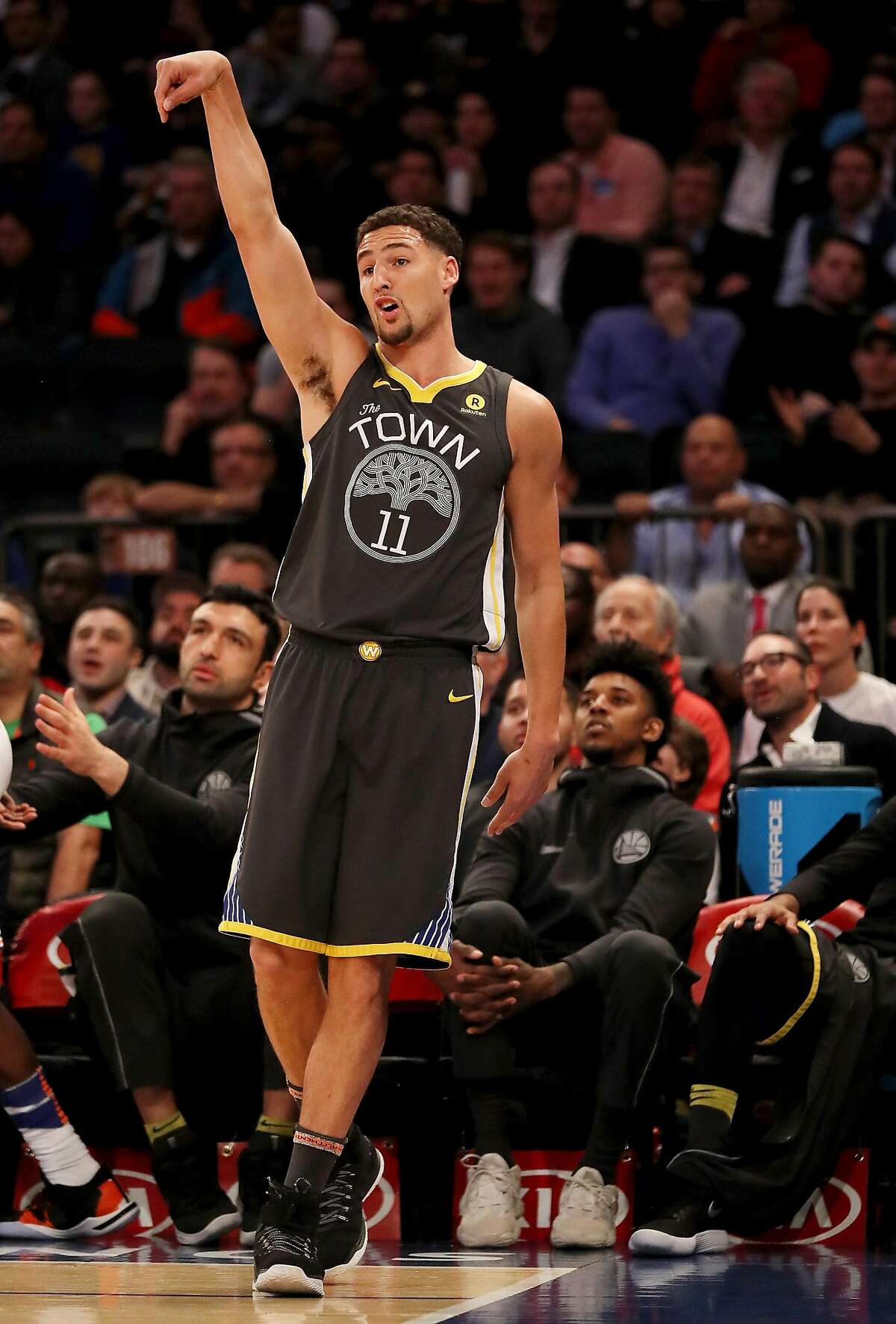 NEW YORK, NY - FEBRUARY 26: Klay Thompson #11 of the Golden State Warriors reacts to his three point shot in the first quarter against the New York Knicks at Madison Square Garden on February 26,2018 in New York City. NOTE TO USER: User expressly acknowledges and agrees that, by downloading and or using this Photograph, user is consenting to the terms and conditions of the Getty Images License Agreement (Photo by Elsa/Getty Images)