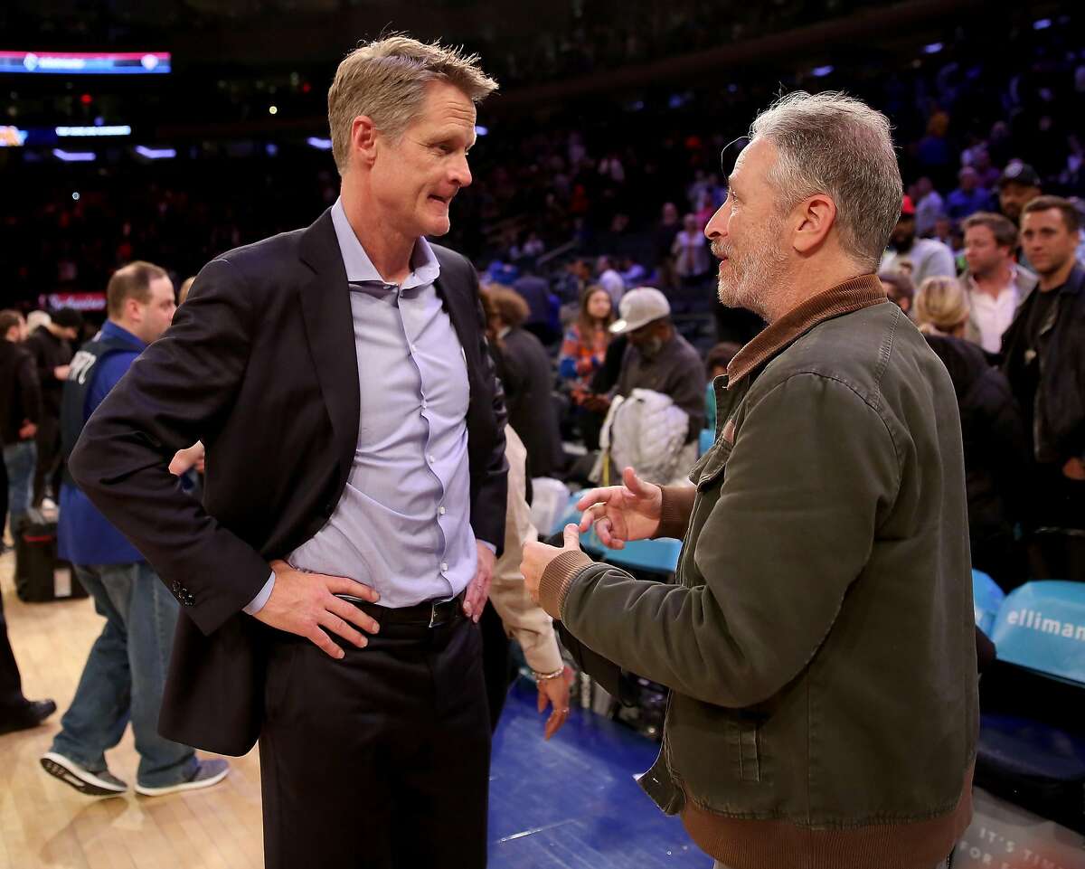 NEW YORK, NY - FEBRUARY 26: Head coach Steve Kerr of the Golden State Warriors talks with Jon Stewart after the game against the New York Knicks at Madison Square Garden on February 26, 2018 in New York City. NOTE TO USER: User expressly acknowledges and agrees that, by downloading and or using this Photograph, user is consenting to the terms and conditions of the Getty Images License Agreement (Photo by Elsa/Getty Images)