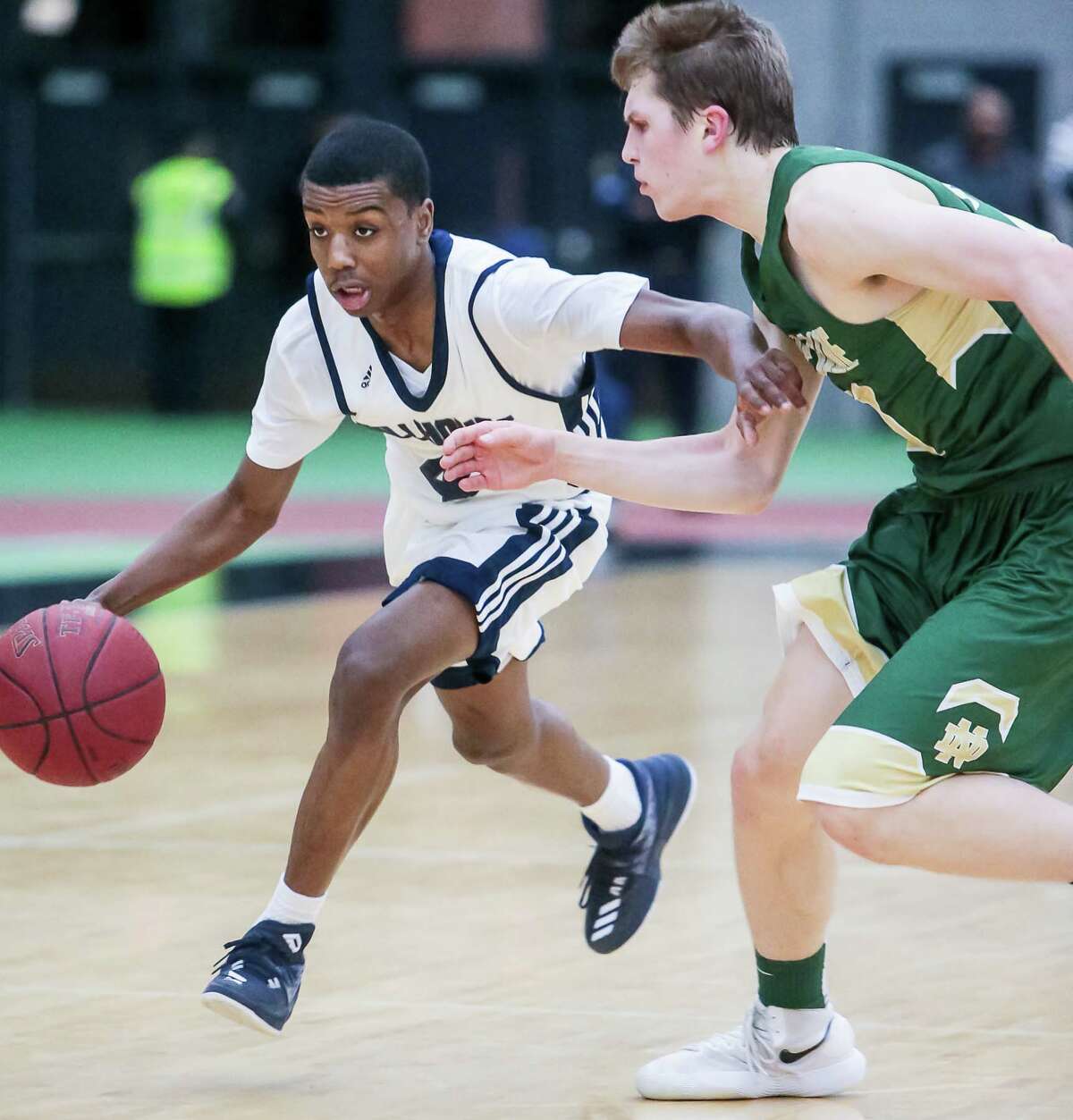 (John Vanacore/For Hearst Connecticut Media) Action from Game two of the SCC Semifinal featuring the Green Knights of Notre Dame of West Haven vs The Academics from Hillhouse. Action was at the Floyd Little Athletic Complex in New Haven Monday February 26, 2017.