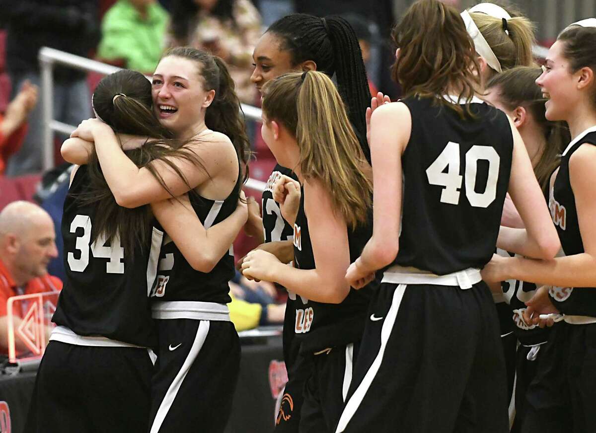 Bethlehem's Molly Kirby and Maggie Kirby embrace after winning a Class AA girls' semifinal basketball game against Shenendehowa on Monday, Feb. 26, 2018 in Guilderland, N.Y. (Lori Van Buren/Times Union)
