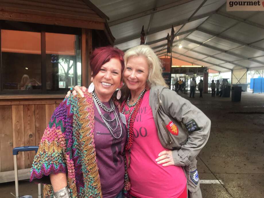 Kim Ackel and Jo Ellen Hughes, who both work at Annette's Touch of Class booth, arrived at the Houston Livestock Show and Rodeo Tuesday morning. Photo: Shelby Webb