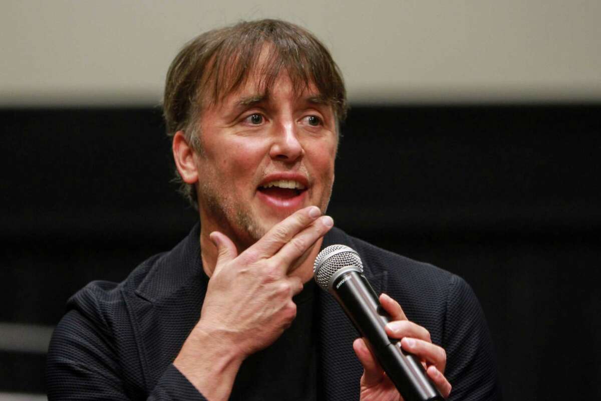 Houston native Richard Linklater talks to the audience after a special screening of his film, "Last Flag Flying." The film was hosted by the Helping A Hero organization, which works with wounded veterans. (For the Chronicle/Gary Fountain, October 26, 2017)