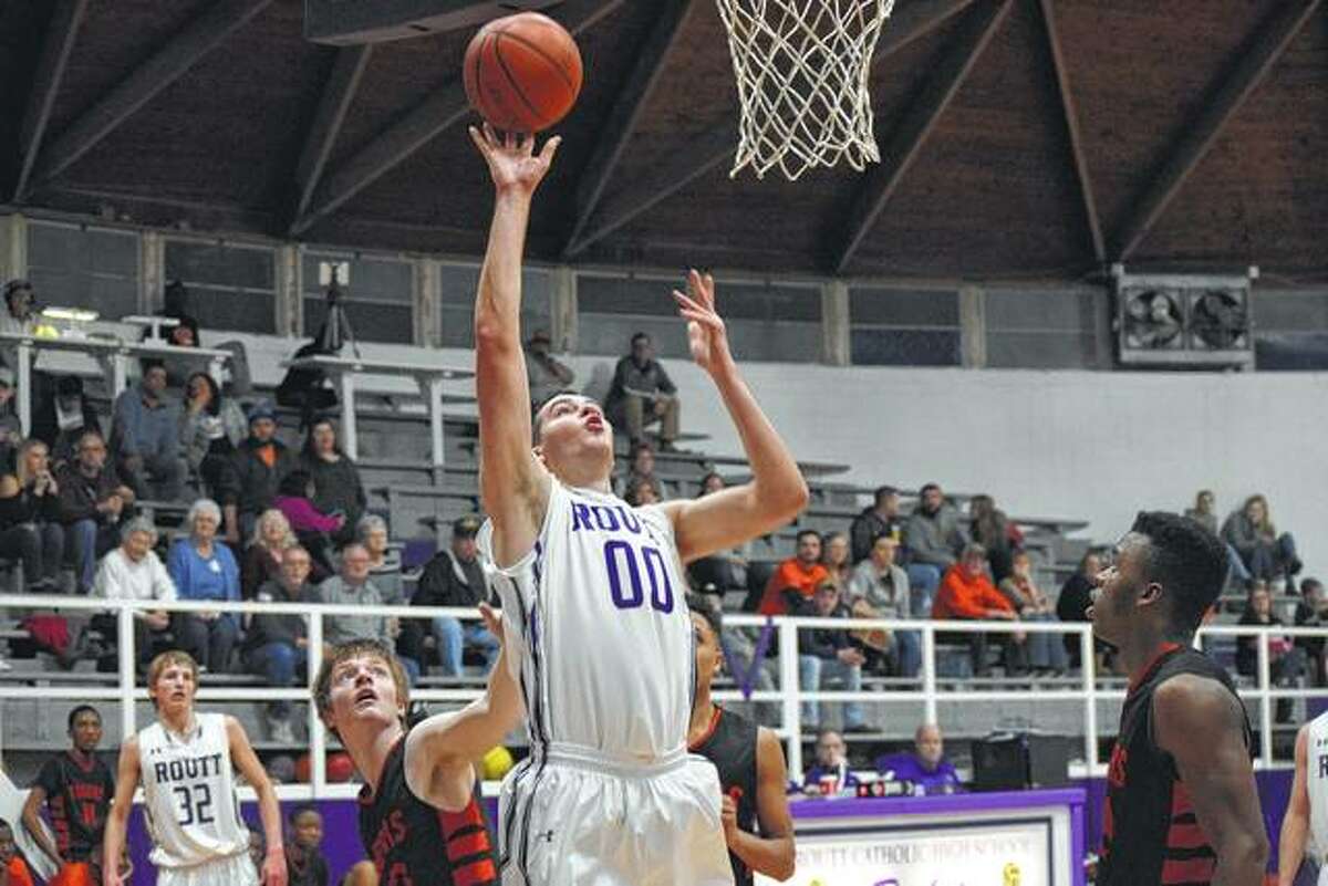 Brooks Moore (00) makes a shot from under the basket Friday night at Routt’s senior night.