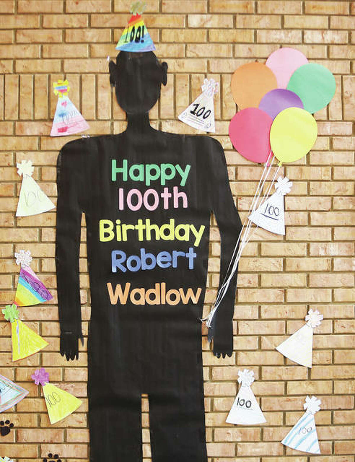 One of the hallway displays at Evangelical School in Godfrey where students have been drawing, writing and learning about the worlds tallest man, Robert Wadlow, on his 100th birthday Thursday. Robert Wadlow died in 1940 at the age of 22 and was 8 feet, 11.1 inches tall.