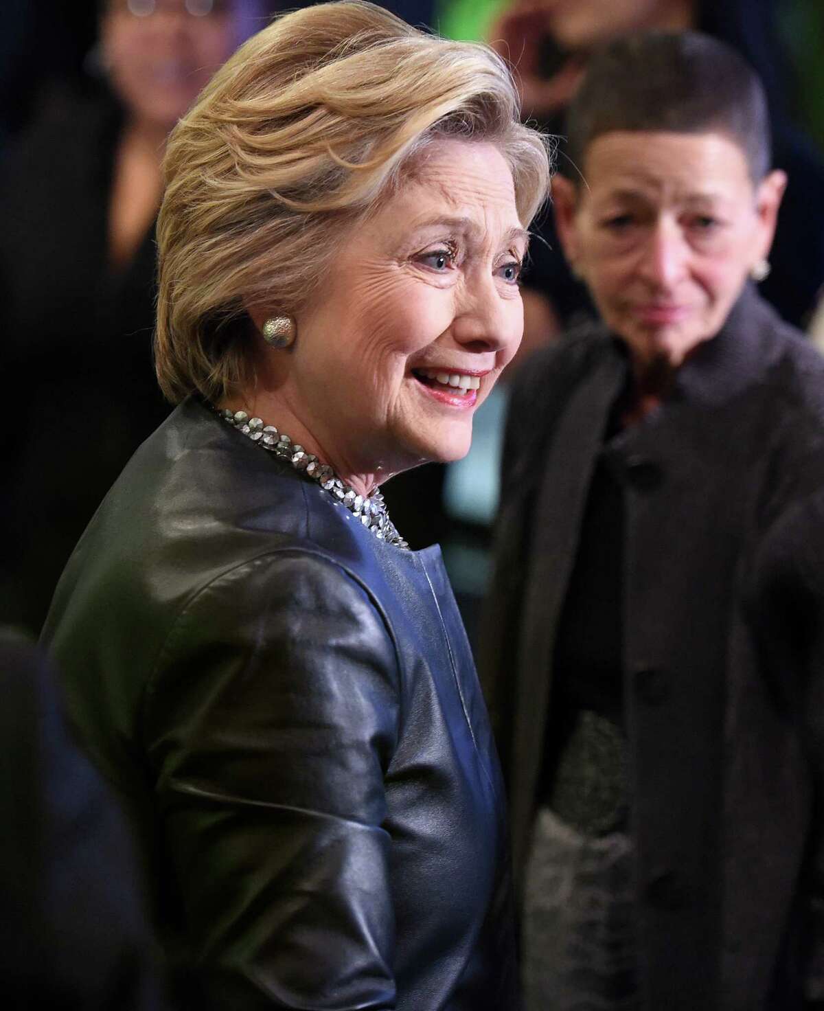 (Arnold Gold-New Haven Register) Democratic presidential candidate Hillary Clinton (center) arrives at a campaign stop at Orangeside on Temple in New Haven, Connecticut, on April 23, 2016.