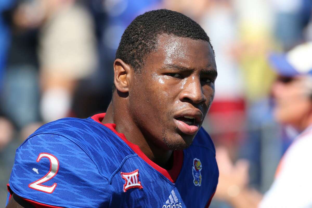 Kansas pass rusher Dorance Armstrong (North Shore) works out for Texans