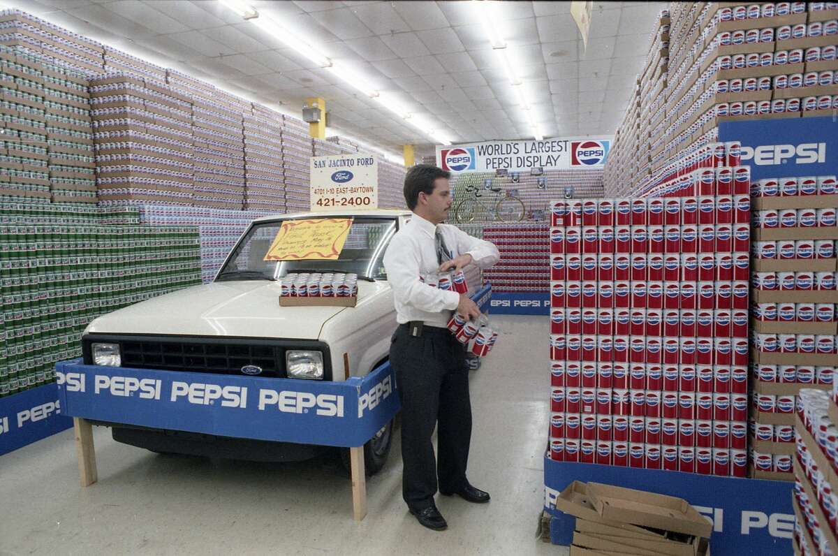 April 7, 1987Bret Holaday, delivery supervisor for Pepsi, manages the world's largest soft drink display at Sac & Save Grocery, 1700 Decker in Baytown.