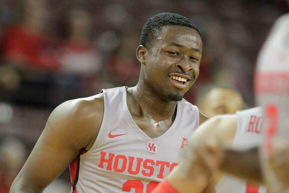 The University of Houston Gabe Grant celebrates one of his three points shots with teammate Galen Robinson Jr. during the second half of basketball game against East Carolina University at Texas Southern University Sunday, Feb. 25, 2018, in Houston. ( Melissa Phillip / Houston Chronicle )