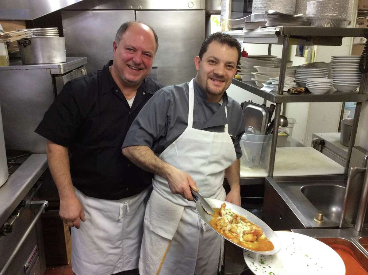 Owner Vincenzo LoMonaco with Chef Atlante plating the Gamberoni Monachina