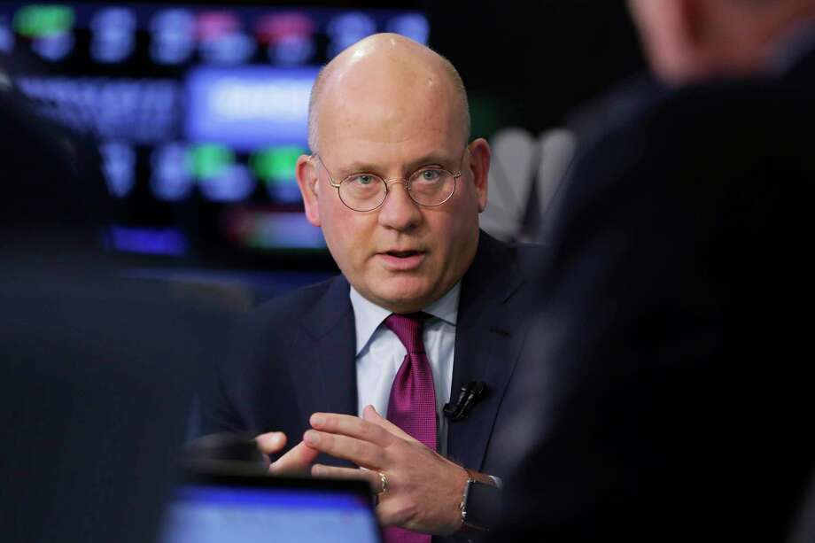 FILE- In this Nov. 14, 2017, file photo, General Electric Chairman and CEO John Flannery is interviewed on the floor of the New York Stock Exchange. Flannery, a longtime insider at GE, was tasked last year with reshaping the company, but the proposed changes at GE have grown more radical over the past several months as negative developments emerge. After cutting the size of its board from 18 to 12 members, General Electric Co. said Monday, Feb. 26, 2018, that a quarter of that board would consist of new members. (AP Photo/Richard Drew, File) Photo: Richard Drew / AP