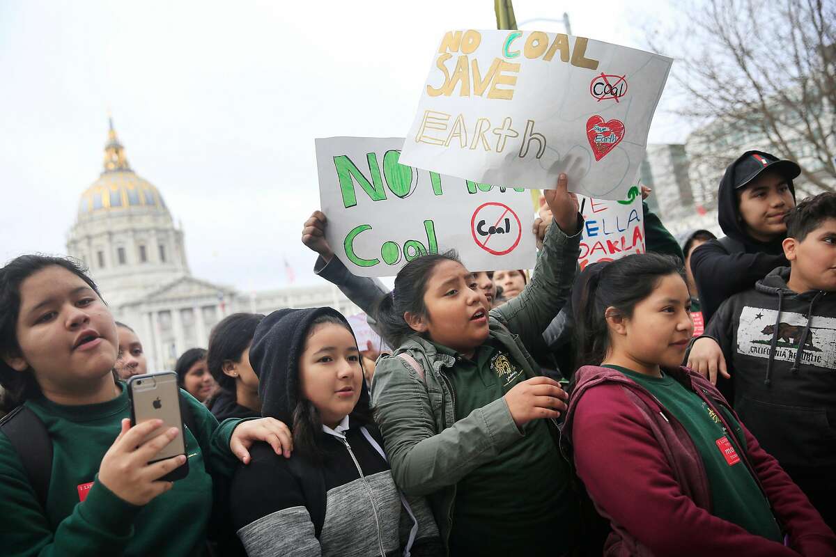 Youth from Oakland rally with others as they demonstrate the proposed repeal of the Clean Power Plan outside the San Francisco Main Library where the U.S. Environmental Protection Agency was holding a listening session on the proposed repeal of the Clean Power Plan on February 28, 2018, in San Francisco, Calif.