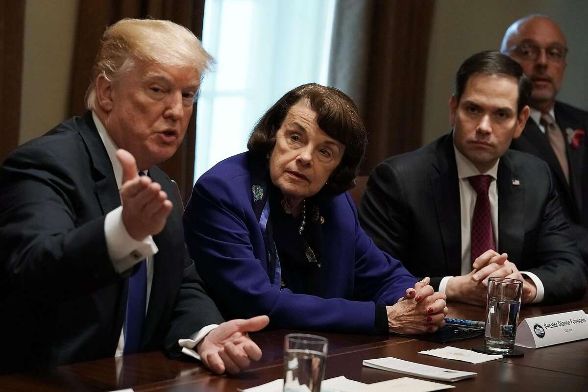 WASHINGTON, DC - FEBRUARY 28: (L-R) U.S. President Donald Trump speaks as Sen. Dianne Feinstein (D-CA), Sen. Marco Rubio (R-FL) and Rep. Ted Deutch (D-FL) listen during a meeting with bipartisan members of the Congress at the Cabinet Room of the White Ho