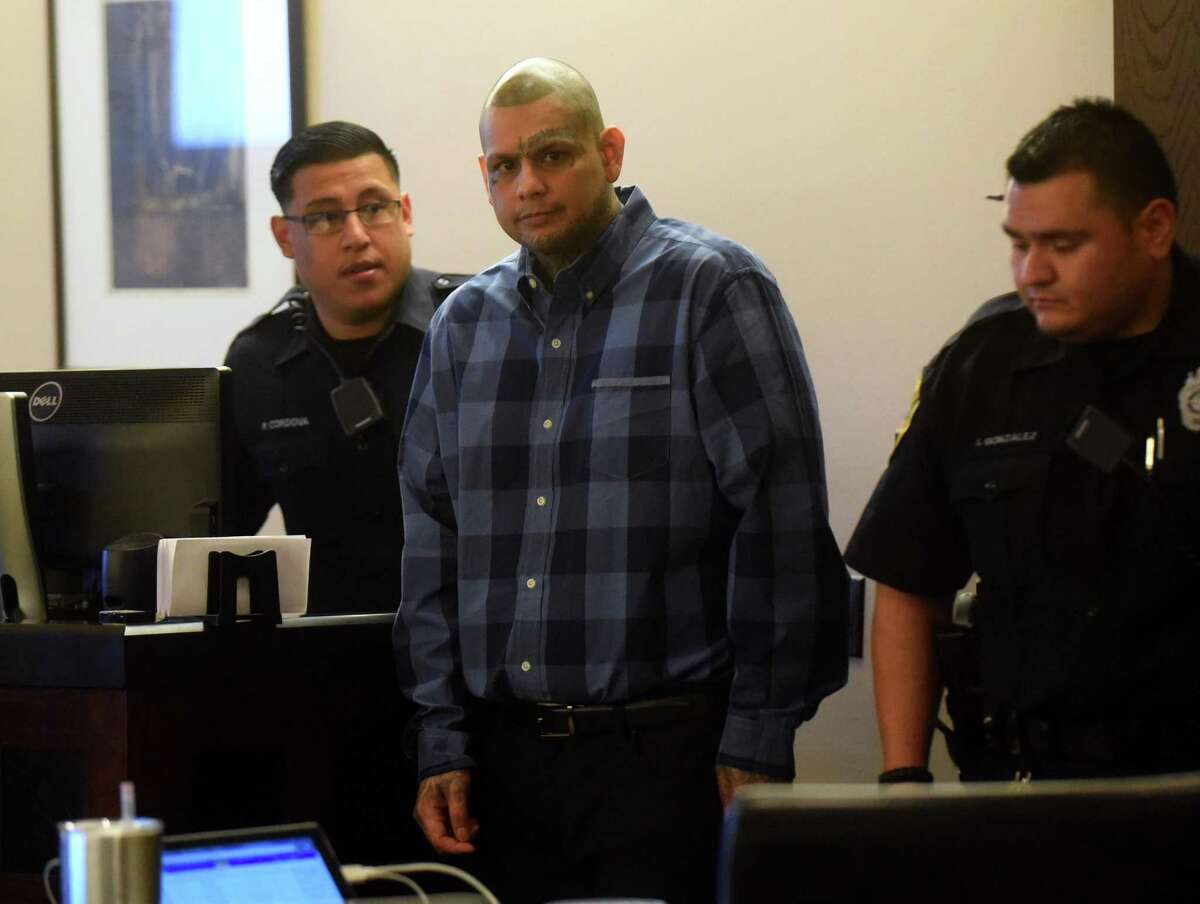 Defendant Gabriel Moreno enters 479th District Court for his murder trial on Wednesday, Feb. 28, 2018. He is one of three defendants accused in the death of Jose Luis Menchaca, who was beaten with baseball bats and his limbs burned on a barbecue pit.