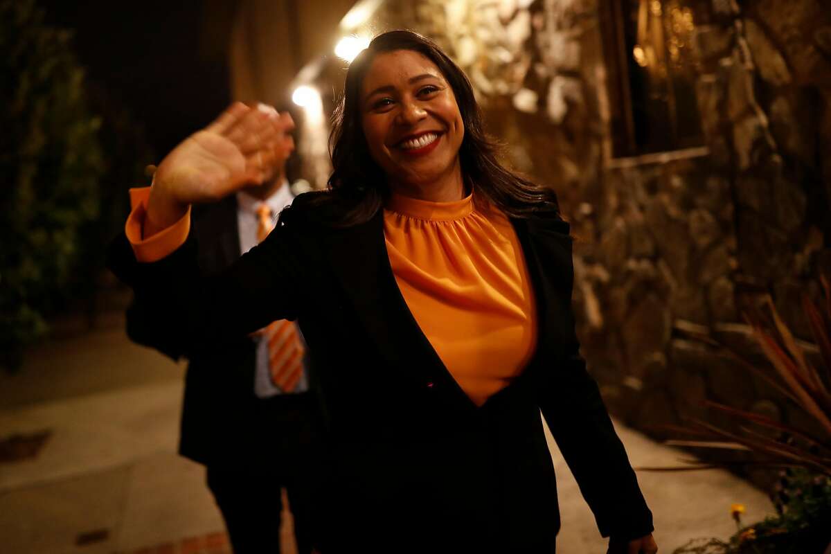 London Breed, President of the San Francisco Board of Supervisors and mayoral candidate, waves as she arrives for a roundtable discussion at the United Irish Cultural Center in San Francisco, Calif. on Wednesday, Feb. 28, 2018.